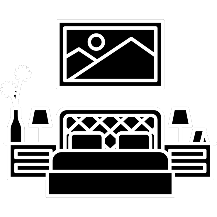 Spacious bedroom with a comfortable bed on the top floor with traditional furnishings, and large windows that offer a serene view of the river